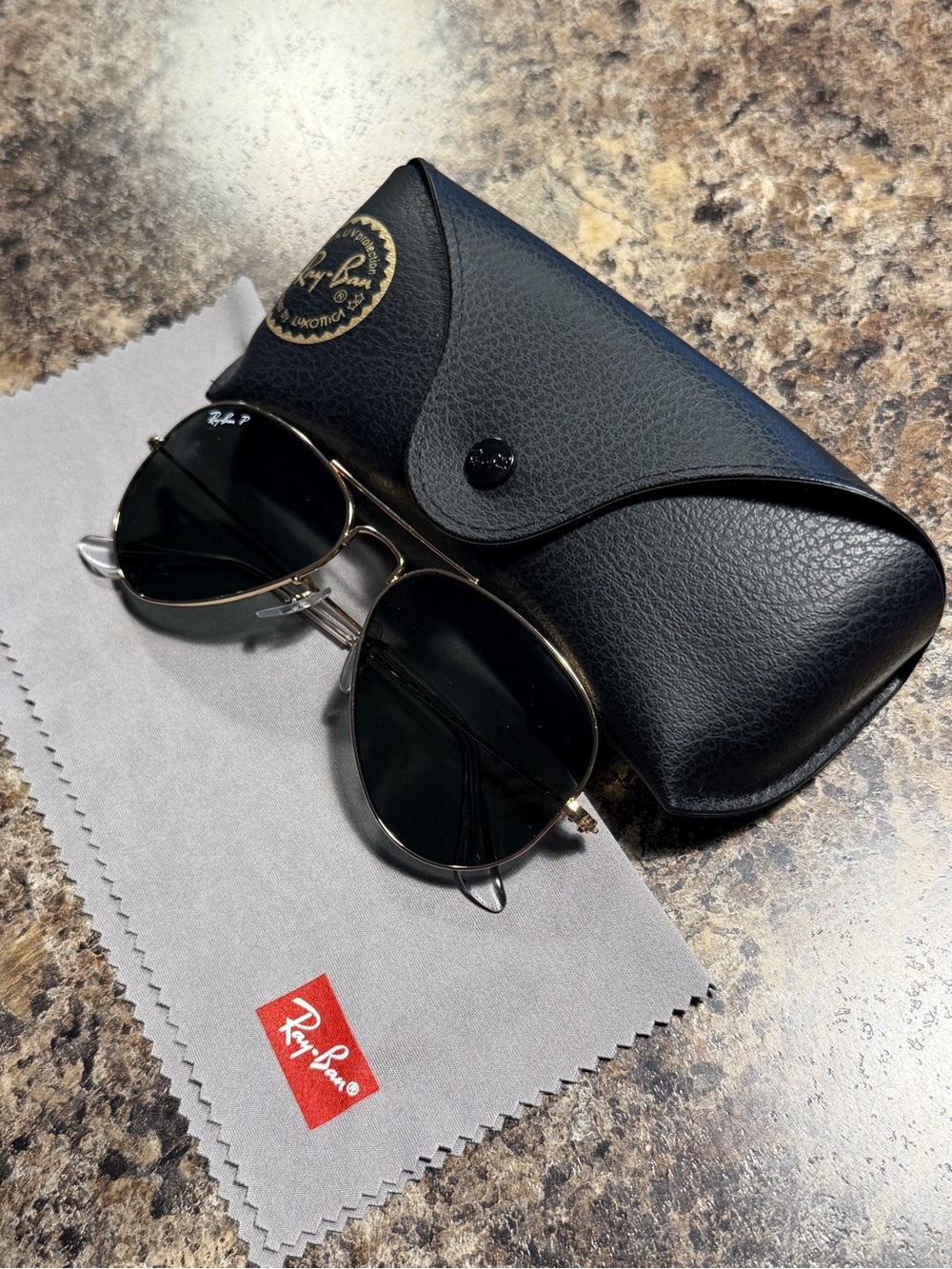 Polarized Ray-Ban Women’s Aviator Sunglasses with Black Lenses & Gold Frame